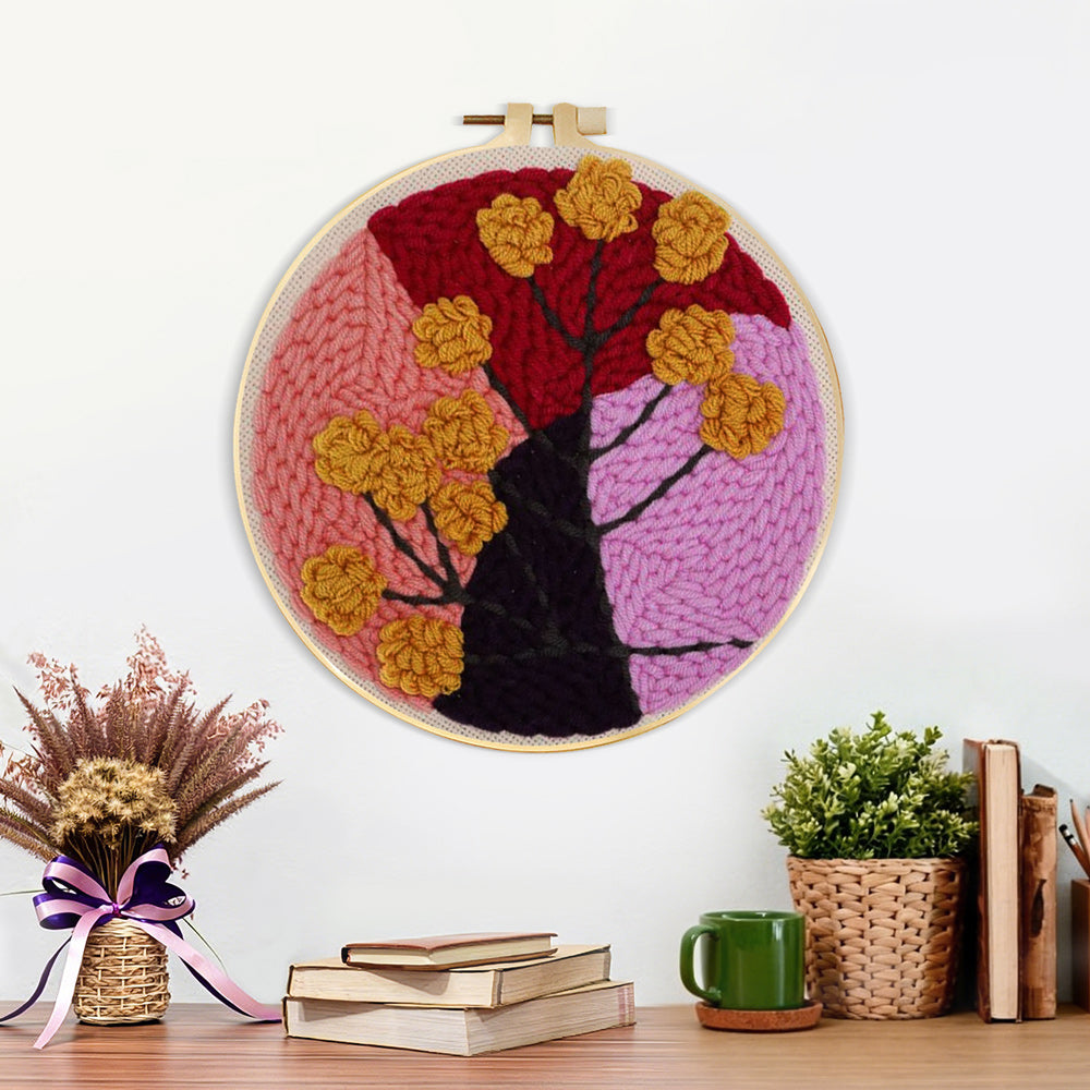 Finished abstract colour block tree with flowers artwork displayed on a wall