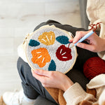 Creating handmade abstract colourful flowers punch needle artwork