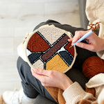 Creating handmade abstract geometric colour blocks punch needle artwork