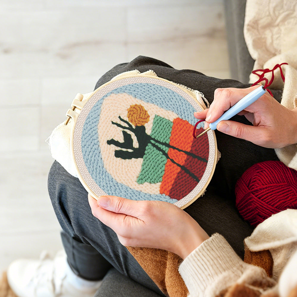 Creating handmade abstract potted plant punch needle artwork