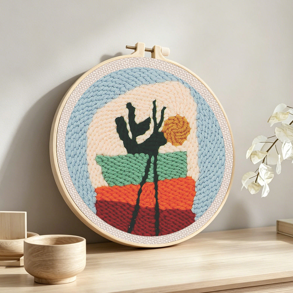 Abstract potted plant punch needle artwork displayed on a table