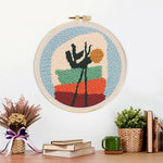 Finished abstract potted plant artwork displayed on a wall