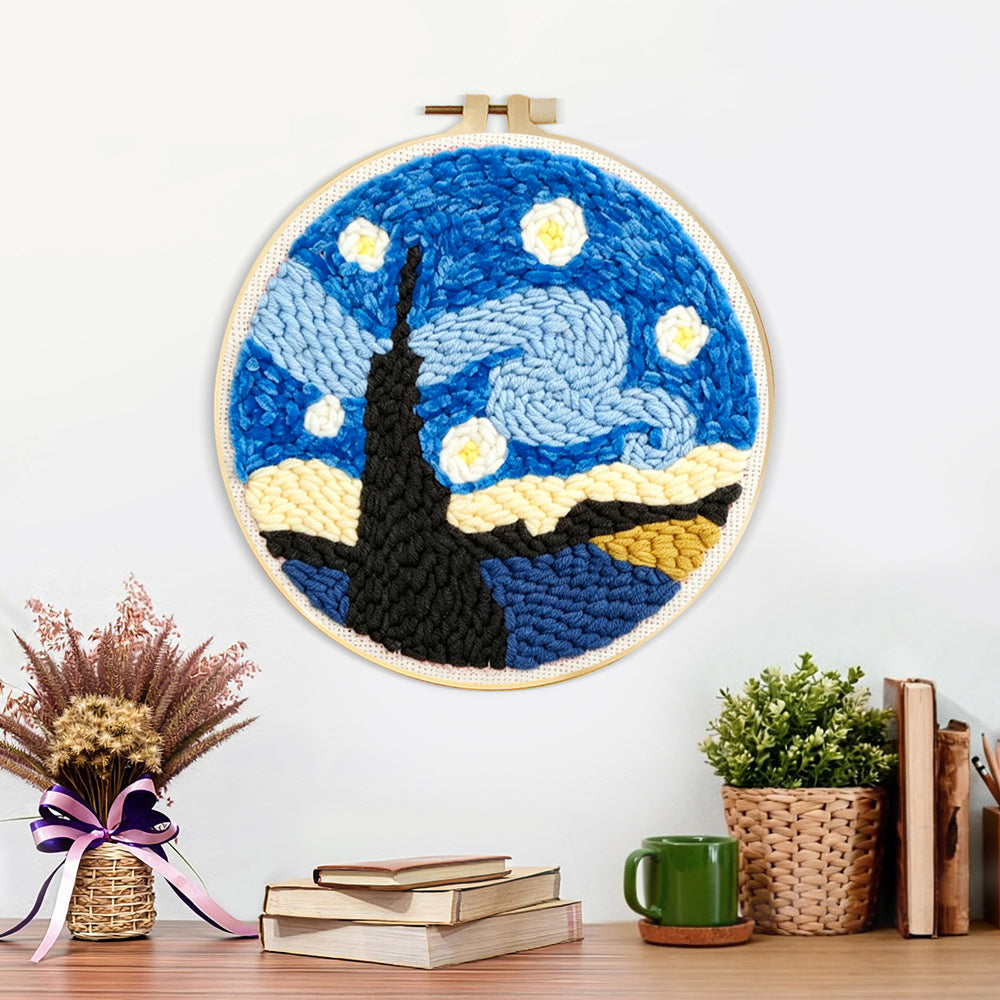 Finished abstract starry night artwork displayed on a wall