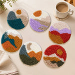 Abstract sun and mountains punch needle coasters used for home decoration