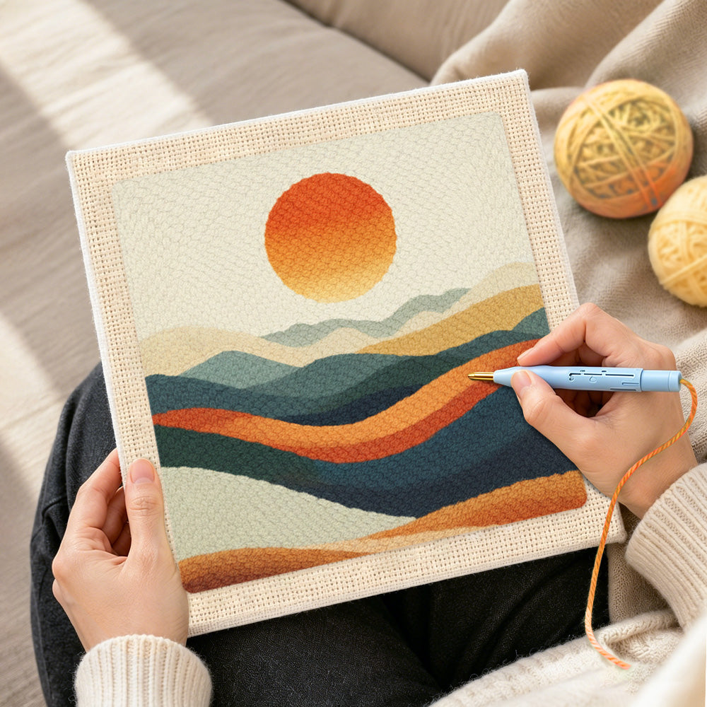 Creating handmade abstract wavy mountain at sunset punch needle artwork