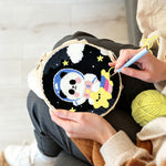 Creating handmade adorable astronaut panda with star punch needle artwork