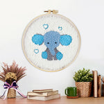 Finished adorable baby elephant artwork displayed on a wall