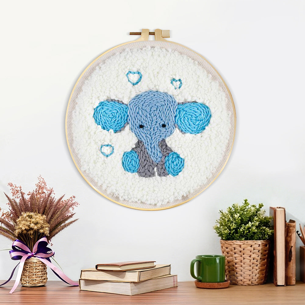 Finished adorable baby elephant artwork displayed on a wall