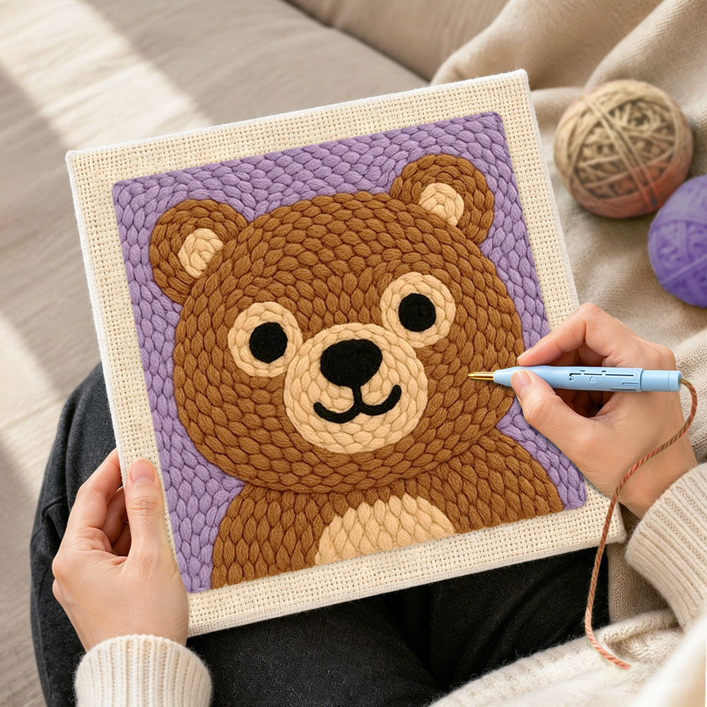 Creating handmade adorable bear face punch needle artwork