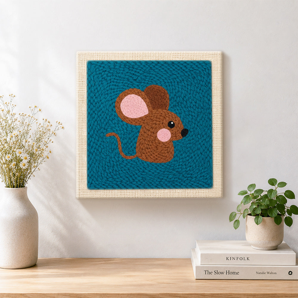 Finished adorable brown mouse artwork displayed on a wall