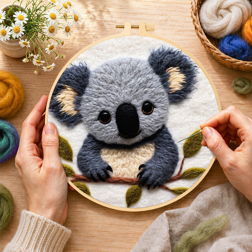 Creating the adorable fluffy koala wool painting by hand with a felting needle