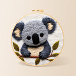 Adorable fluffy koala needle felting kit for beginners with a round wooden frame