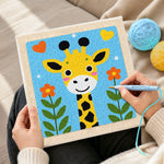 Creating handmade adorable love-themed giraffe punch needle artwork