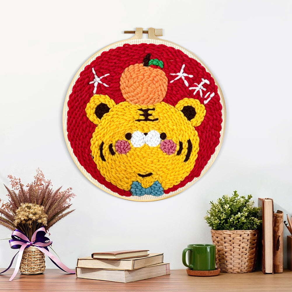 Finished adorable lucky tiger with an orange artwork displayed on a wall