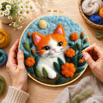 Creating the adorable orange and white kitten wool painting by hand with a felting needle