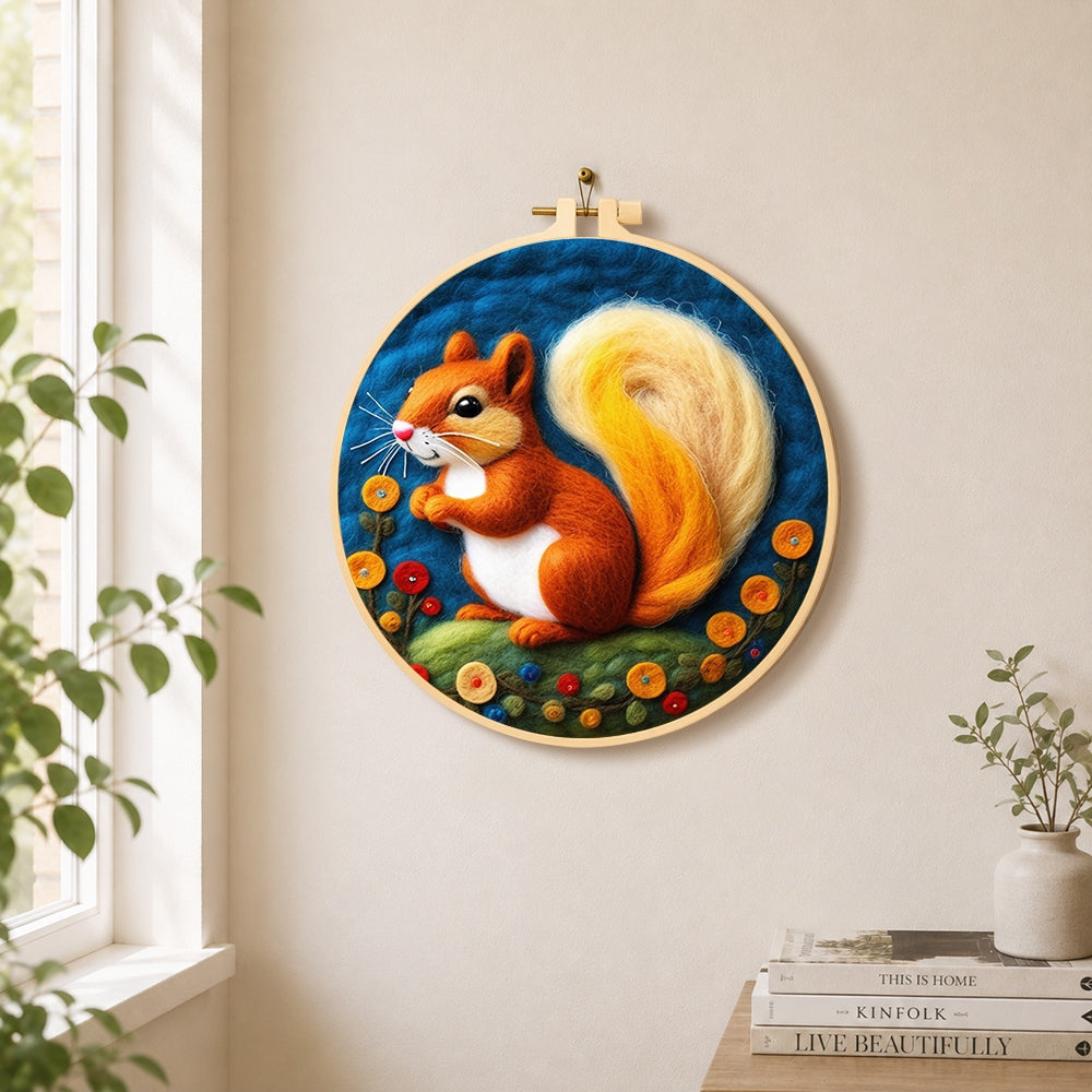 Adorable orange squirrel with golden tail needle felt wall art displayed in a bright home interior