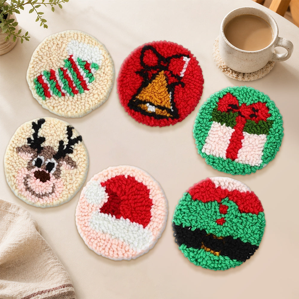 Adorable reindeer and bell punch needle coasters used for home decoration