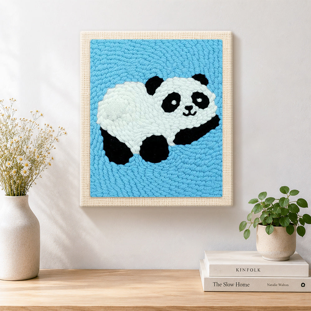 Finished adorable relaxing panda artwork displayed on a wall