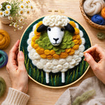 Creating the adorable sheep and green grass wool painting by hand with a felting needle