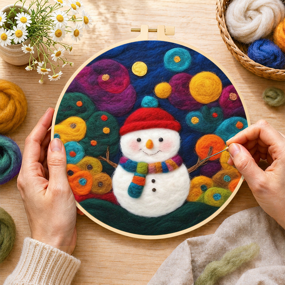 Creating the adorable snowman with scarf wool painting by hand with a felting needle