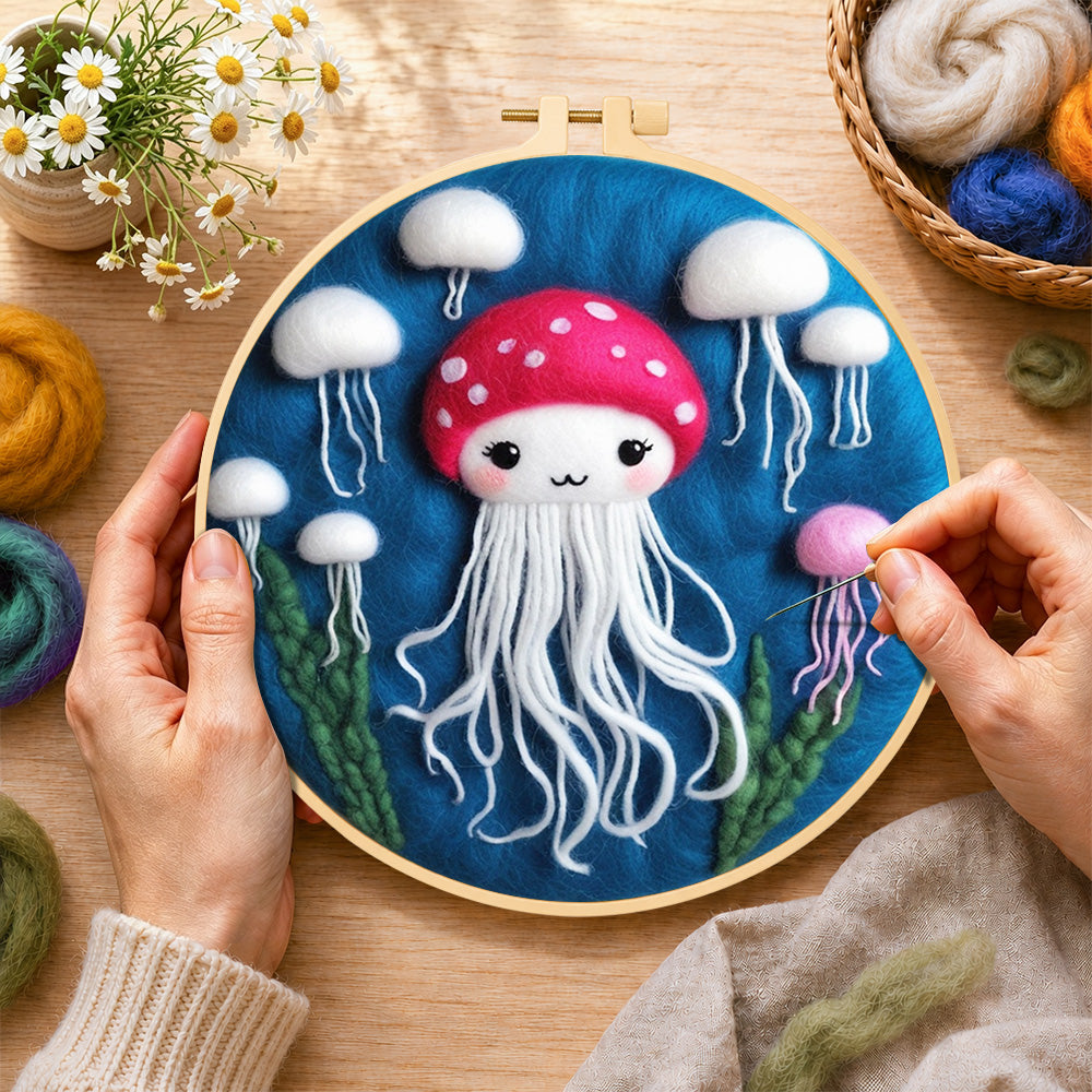 Creating the adorable white jellyfish wool painting by hand with a felting needle