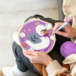 Creating handmade angel swan and flowers punch needle artwork