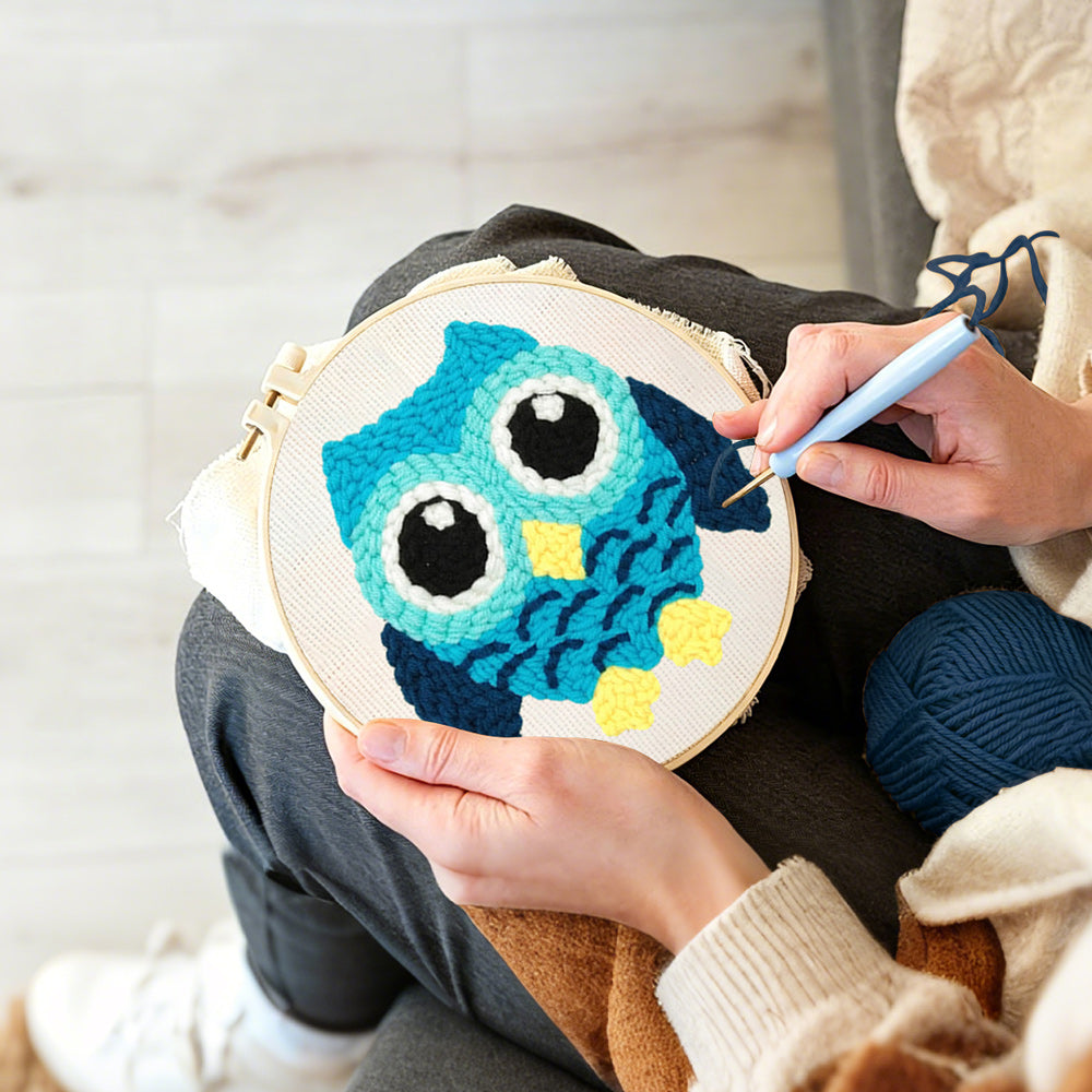 Creating handmade aqua owl punch needle artwork
