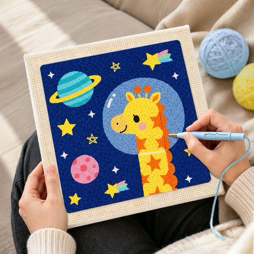 Creating handmade astronaut giraffe with planets punch needle artwork