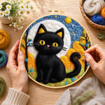 Creating the autumn black cat wool painting by hand with a felting needle