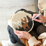 Creating handmade autumn mountains and deer punch needle artwork