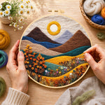 Creating the autumn mountains and plants wool painting by hand with a felting needle