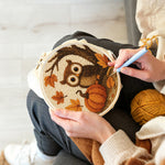 Creating handmade autumn pumpkin and owl punch needle artwork