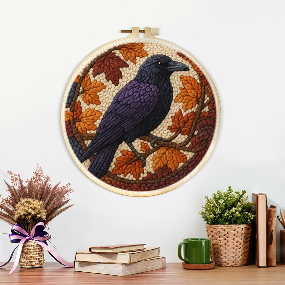 Finished autumn raven artwork displayed on a wall