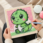 Creating handmade baby green dinosaur with big eyes punch needle artwork