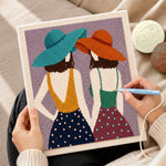 Creating handmade back view women in hats punch needle artwork