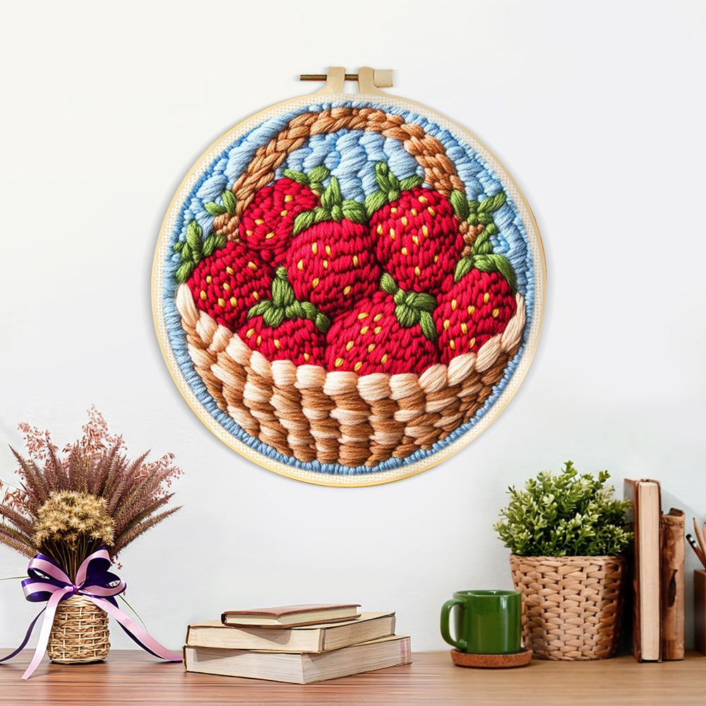 Finished basket of fresh strawberries artwork displayed on a wall