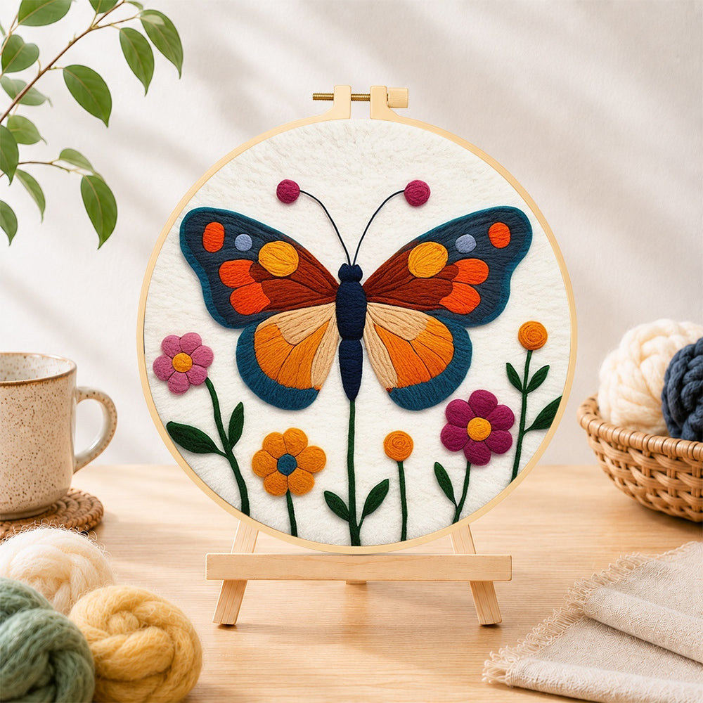Finished beautiful geometric butterfly needle felting displayed on a wooden easel