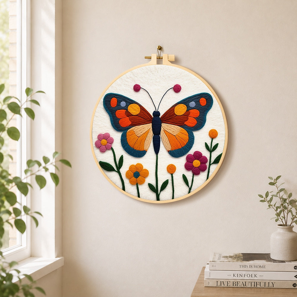 Beautiful geometric butterfly needle felt wall art displayed in a bright home interior