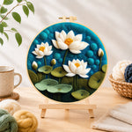 Finished beautiful lotus pond needle felting displayed on a wooden easel