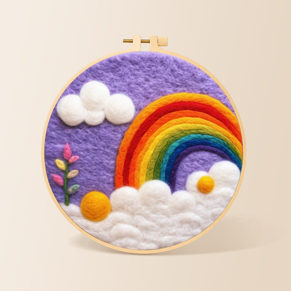 Beautiful rainbow and white clouds in the purple sky needle felting kit for beginners with a round wooden frame