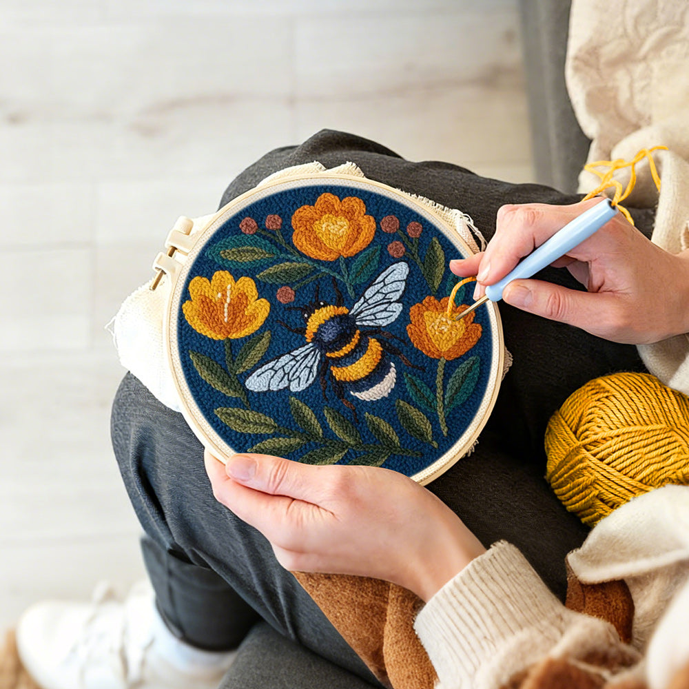 Creating handmade bee and orange flowers punch needle artwork