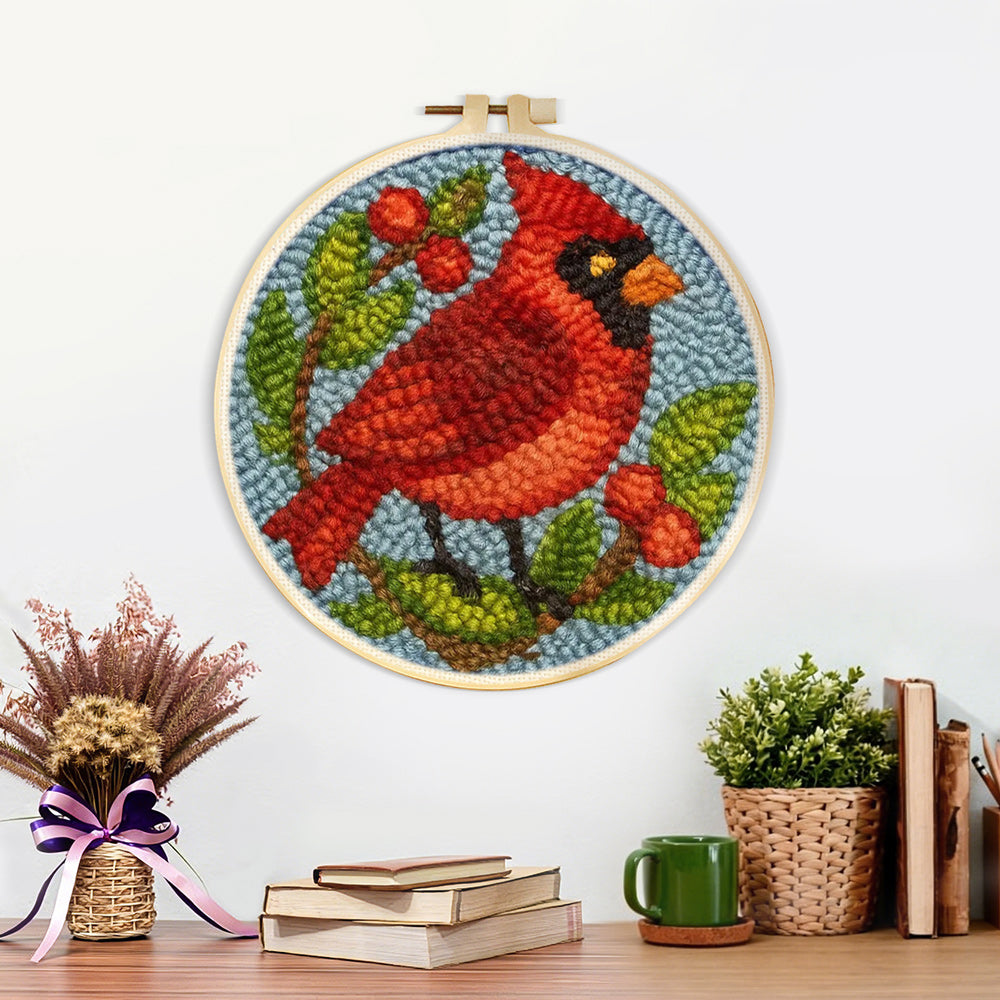 Finished berry cardinal artwork displayed on a wall
