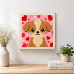 Finished big-eyed puppy with red hearts artwork displayed on a wall