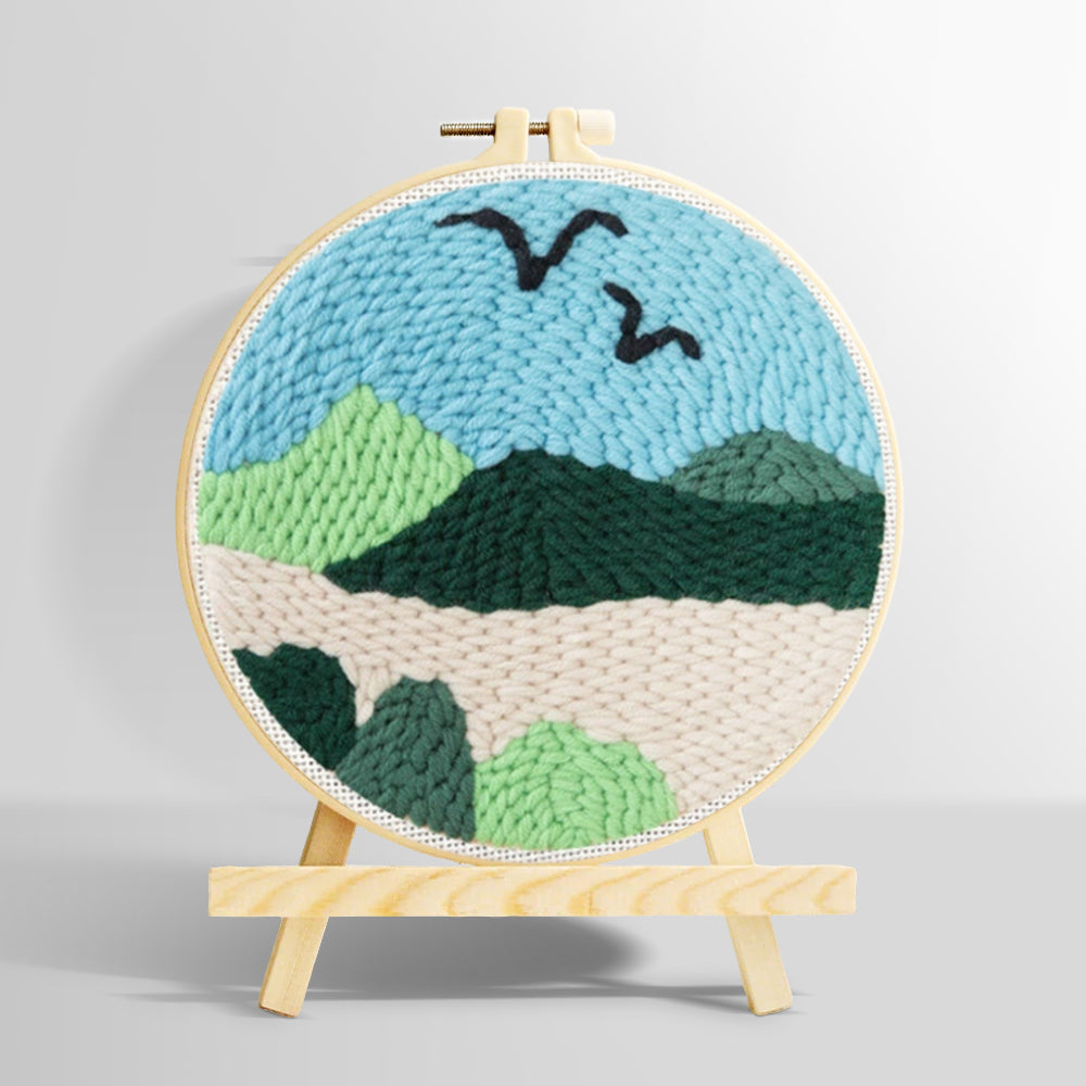 Birds over green mountain landscape punch needle kit for beginners