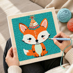 Creating handmade birthday party fox with cone hat punch needle artwork