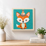 Finished birthday party fox with cone hat artwork displayed on a wall