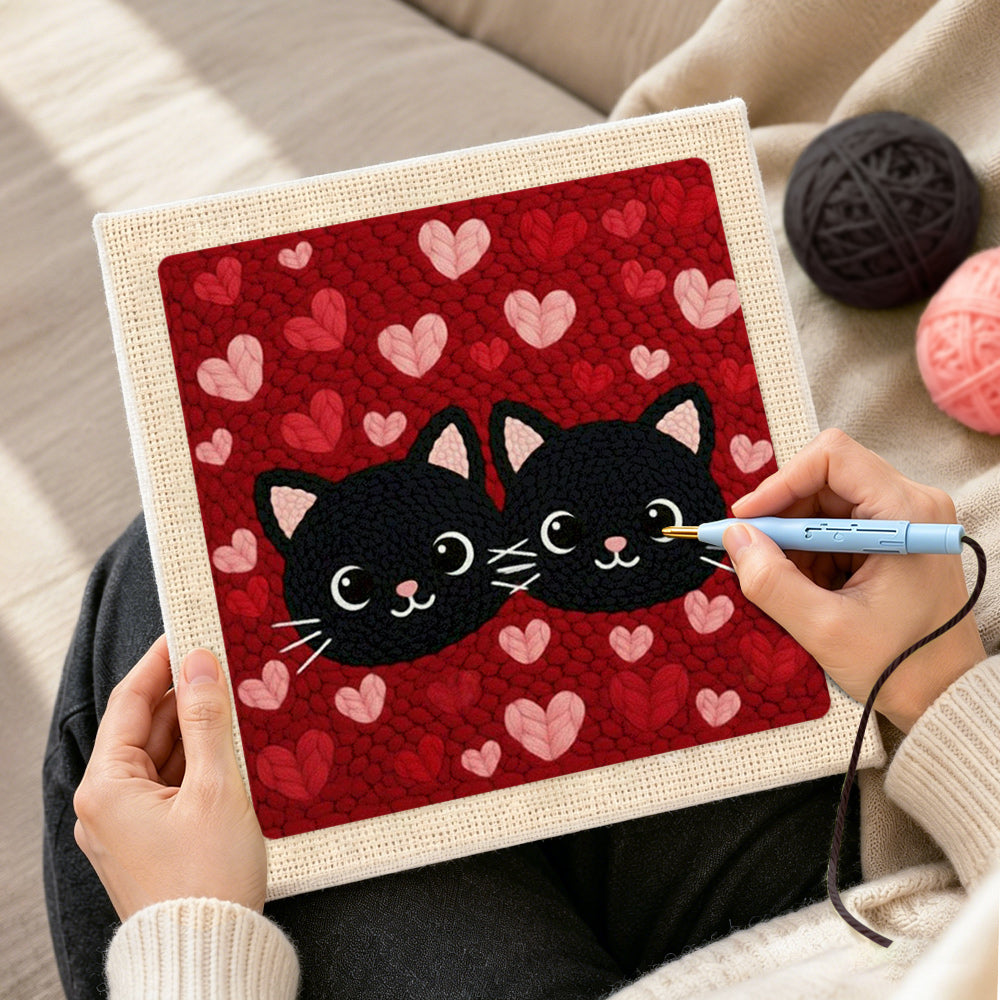 Creating handmade black cat couple surrounded by hearts punch needle artwork