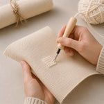 Blank punch needle practice cloth being used for a punch needle project