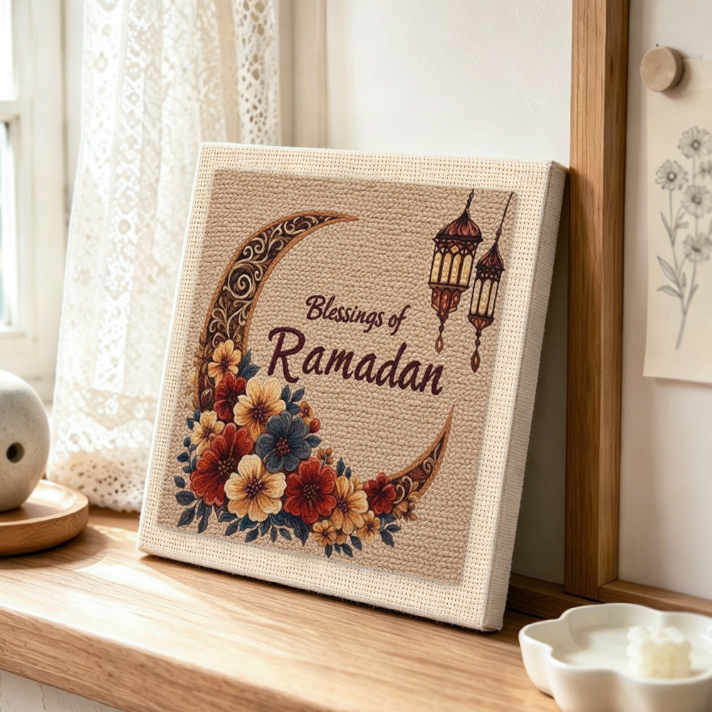 Blessings of ramadan and floral crescent moon punch needle artwork displayed on a table