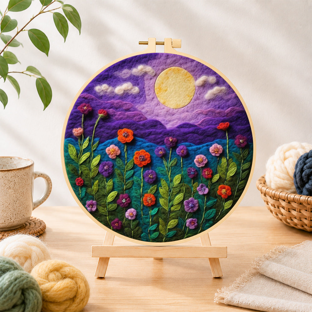 Finished blooming flowers under the purple night moon needle felting displayed on a wooden easel